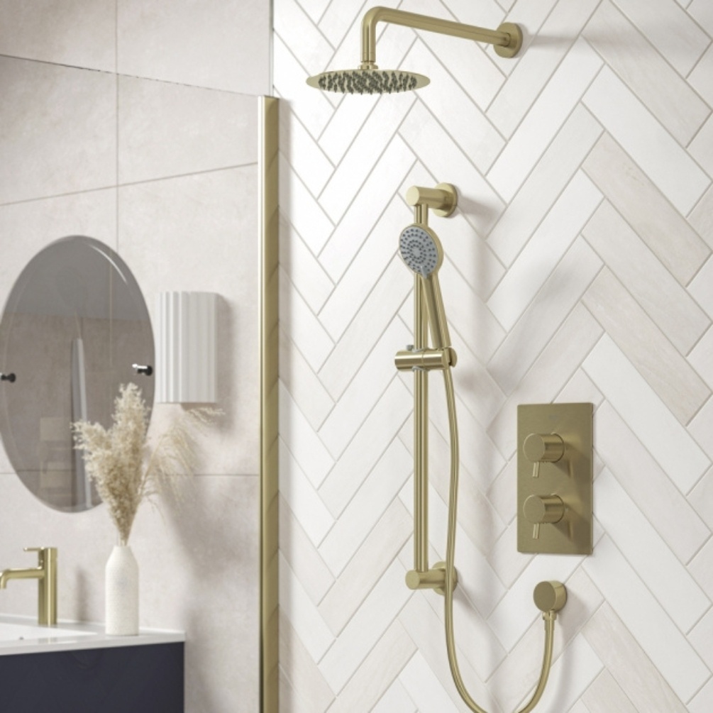Lifestyle image of the Bristan Prism Brushed Brass Dual Outlet Thermostatic Shower Pack